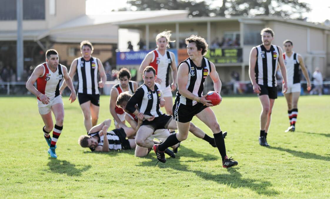 GAME-CHANGER: Camperdown's Cam Spence bounds out of a pack during the 2018 Hampden league grand final. Picture: Morgan Hancock