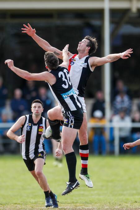 TALL TIMBER: Camperdown's Will Rowbottom and Koroit's Jeremy Hausler battle in the ruck. Picture: Morgan Hancock