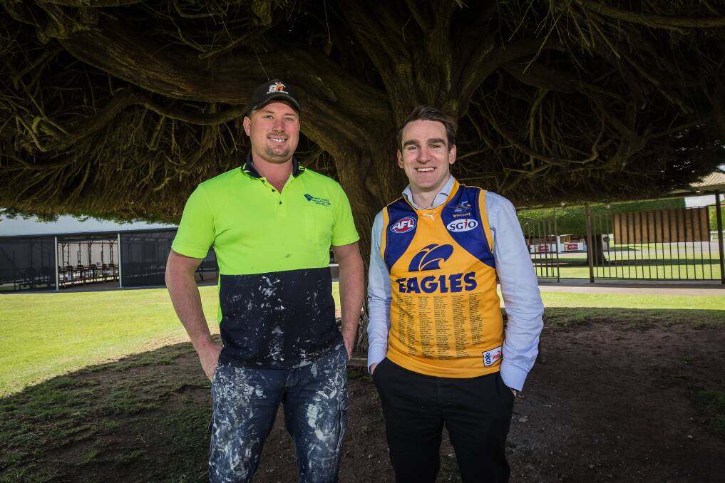 Loyal: Former Eagles player David Haynes and Warrnambool racing club CEO and West Coast supporter Peter Downs.  Picture: Christine Ansorge