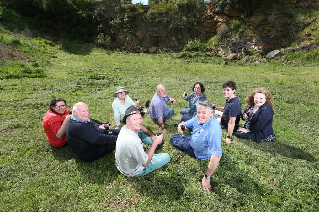 Members of the Warrnambool community Garden celebrate with a glass of sparkly in the quarry. Picture: Michael Chambers