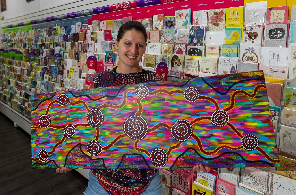 Connections: Indigenous artist Tinika Clifford is displaying her 17-piece mural entitled 'Community Connection through Community Spirit' on the walls of Warrnambool's Gateway Newsagency. Picture: Morgan Hancock