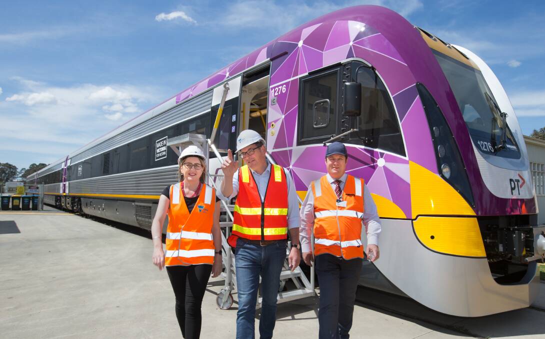 New plan: Transport Minister Jacinta Allan, Premier Daniel Andrews and train manufacturer Bombardier CEO Paul Brown ahead of Labor's election pledge for fast trains on Geelong and Ballarat services only. Picture: Simon Schluter