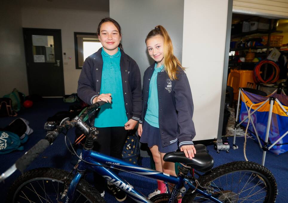 Getting active: Warrnambool West Primary School students Anzyha Folima, 12, and Sophie Ratcliff, 12, are set to go cycling, and try other activities under a new eight-week program. Picture: Morgan Hancock