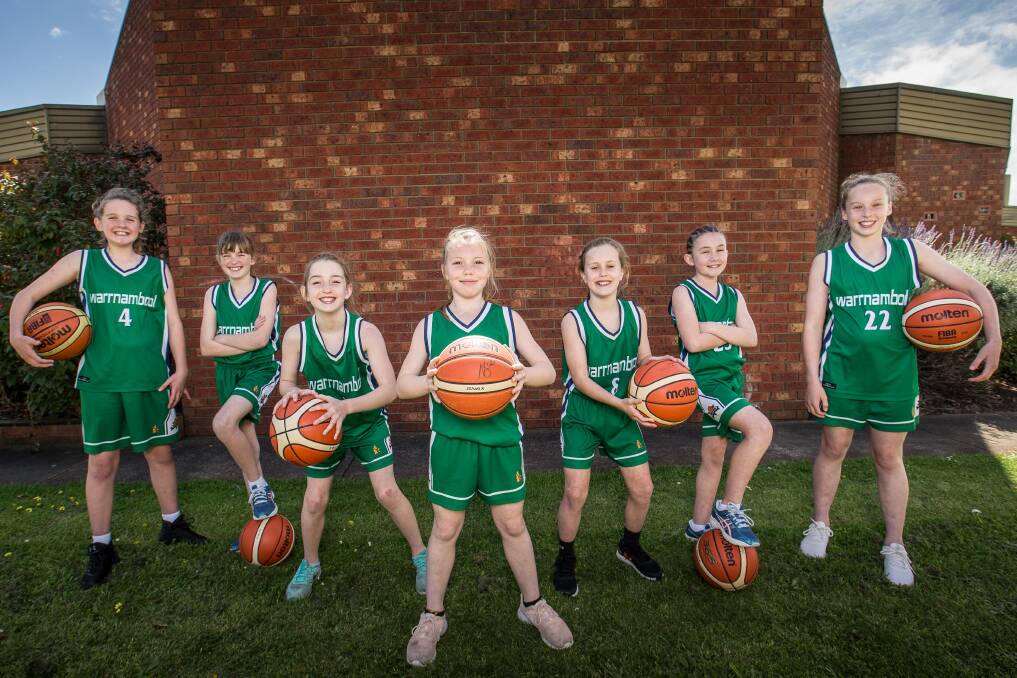 GREEN MACHINE: Warrnambool Mermaids' under 12 basketballers Eve Covey, 10, Olivia Lenehan, 10, Indigo Sewell, 10, Shelby O'Sullivan, 10, Satu Johnstone, 10, Lucy McLaren, 9, and Poppy Myers, 10, will compete at the Warrnambool Seaside Junior Basketball Classic this weekend. Picture: Christine Ansorge