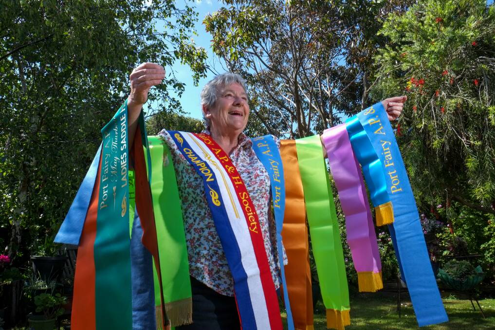 Roll up: Port Fairy Show assistant secretary Jenny McLean with some of the ribbons to be awarded at Saturday's show. Picture: Rob Gunstone