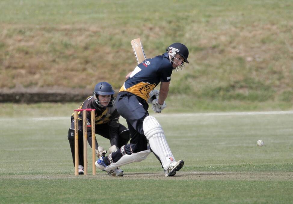HIT OUT: Woodford middle-order batsman Mikey Boyd gets into position to launch a lofted drive during the Eels victory over Merrivale on Saturday.
