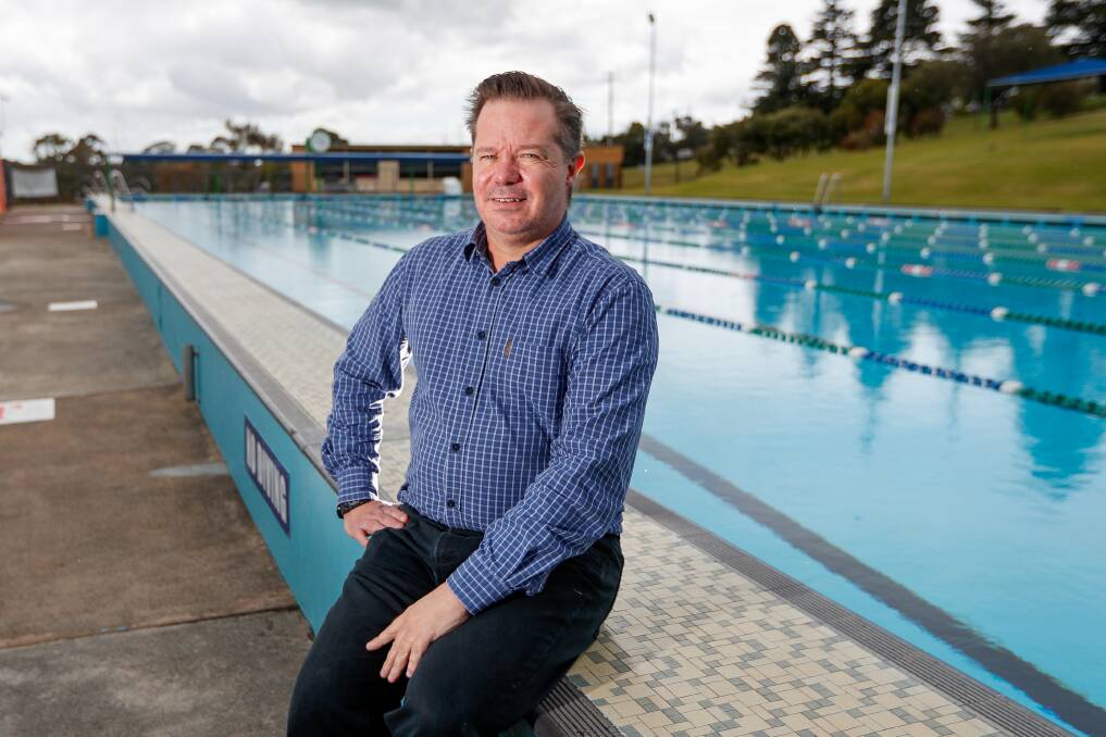 AWESOME: AquaZone manager Ray Smith sits on the edge of the outdoor pool, which has been filled up for the summer months.  
