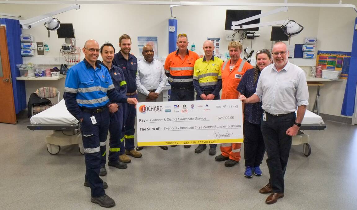 WOW: Lochard Energy's Josh McKenzie and Timboon and District Healthcare Service CEO Gerry Sheehan present the $26,000 donation to the hospital. Picture: Rob Gunstone