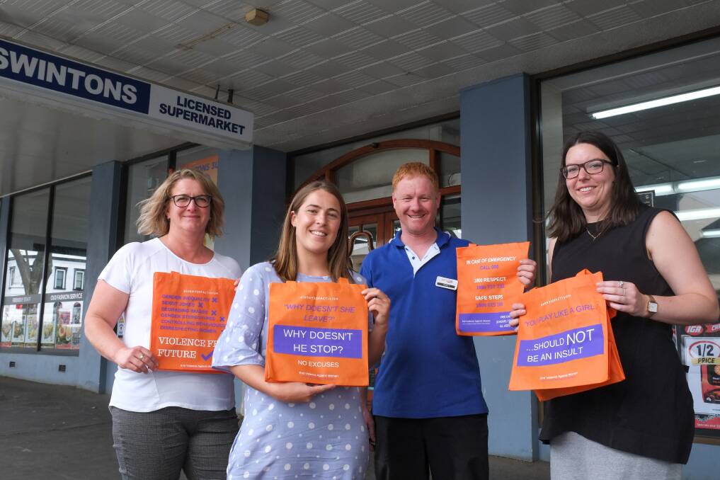PICK A BAG UP FOR FREE: Women's Health and Well Being Barwon South West acting chief Justine Devonport, Thalia Robertson, Swintons IGA manager Brett Maloney, and Jane Moriarty with some of the reuseable bags. Picture: Rob Gunstone