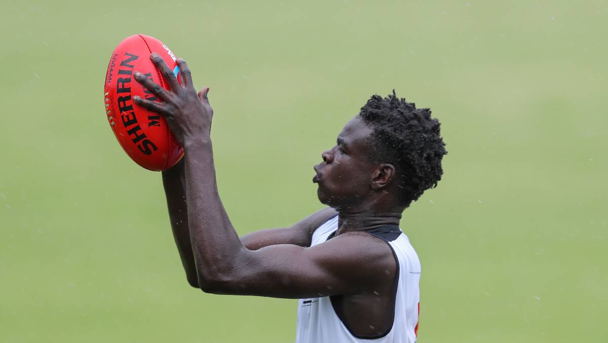 READY TO GO: South Warrnambool's Emmanuel Ajang takes a mark during Rebels training earlier this year. Picture: Morgan Hancock