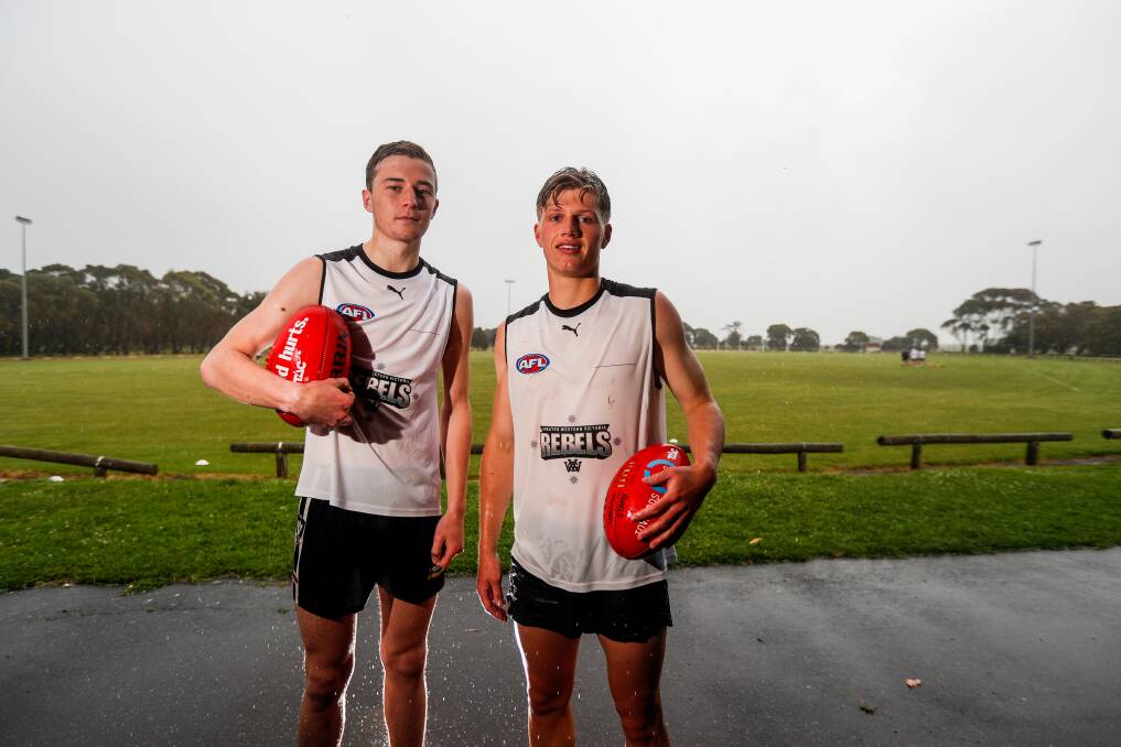Young guns: Camperdown's Toby Mahony and South Warrnambool's Jay Rantall pose for a picture during Rebels training. Picture: Morgan Hancock