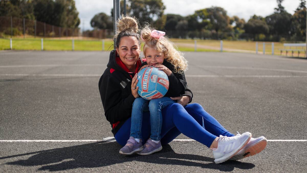 NEW START: Donna Chatfield with her daughter Layla, 5, is excited to be jumping into coaching East Warrnambool's A grade netball side. Picture: Morgan Hancock