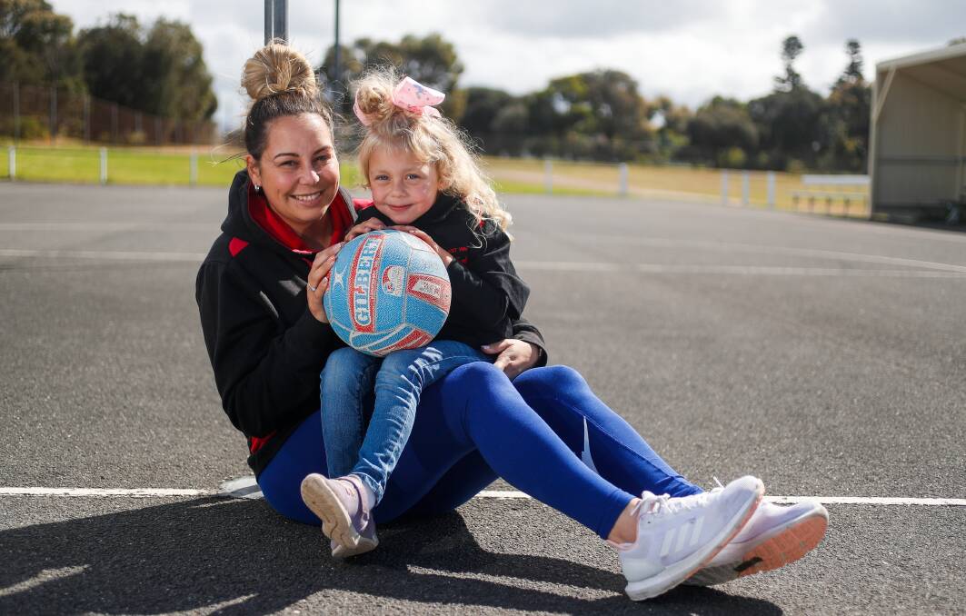 Ready to fly: Donna Chatfield with her daughter, Layla, 5, is excited to coach East Warrnambool in its first match of the Warranmbool and District Football Netball League season. Picture: Morgan Hancock