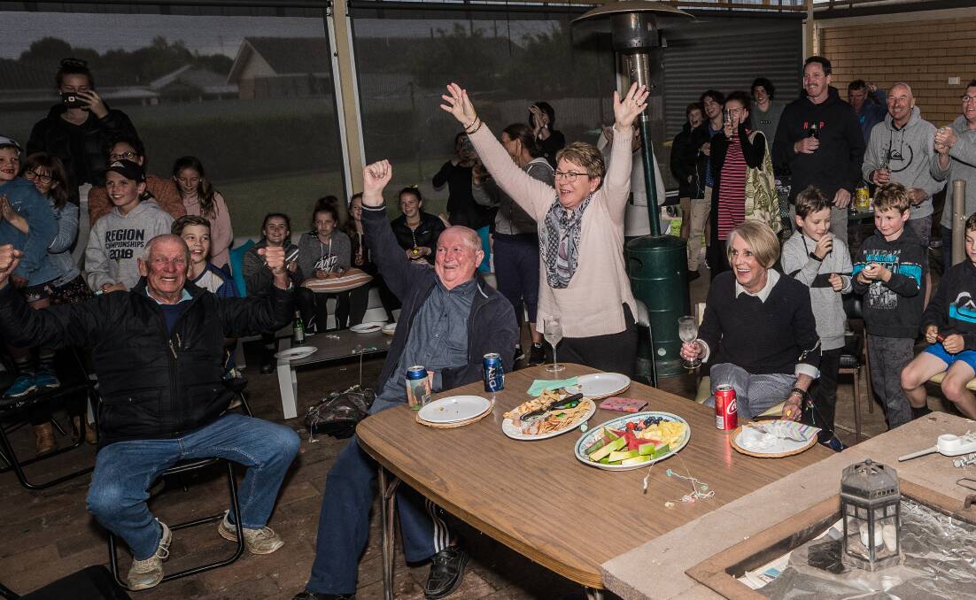 Emotion: Peter and Margaret Walsh and Margie Sinnott celebrate Cobden export Sam Walsh being called out as the number one AFL draft pick during a get-to-gether in Cobden. Picture: Christine Ansorge