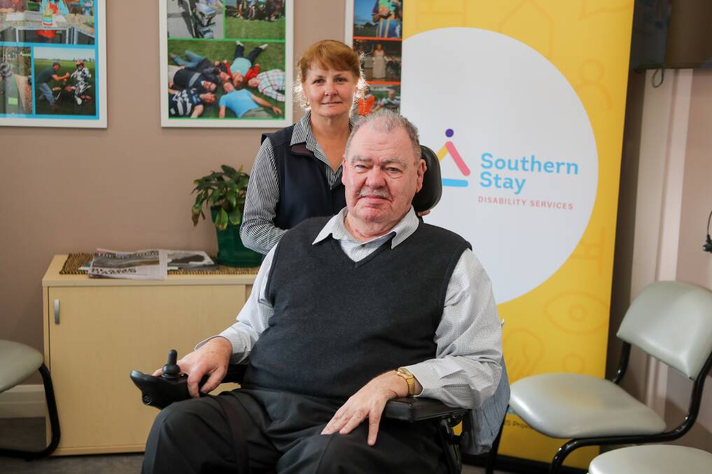 Keeping on: Disability support worker Debbie Philp and Ray Ahearn, who would not have been able to remain at home if not for the aid of the Southern Stay Disability Services. Picture: Morgan Hancock
