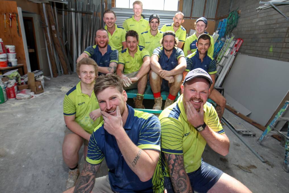 Mo Bros: J&P Advanced Plastering owners Jesse Scott and Paul McDowall have been growing out their moustaches for Movember with their staff, raising over $3,500 in the process. Picture: Rob Gunstone