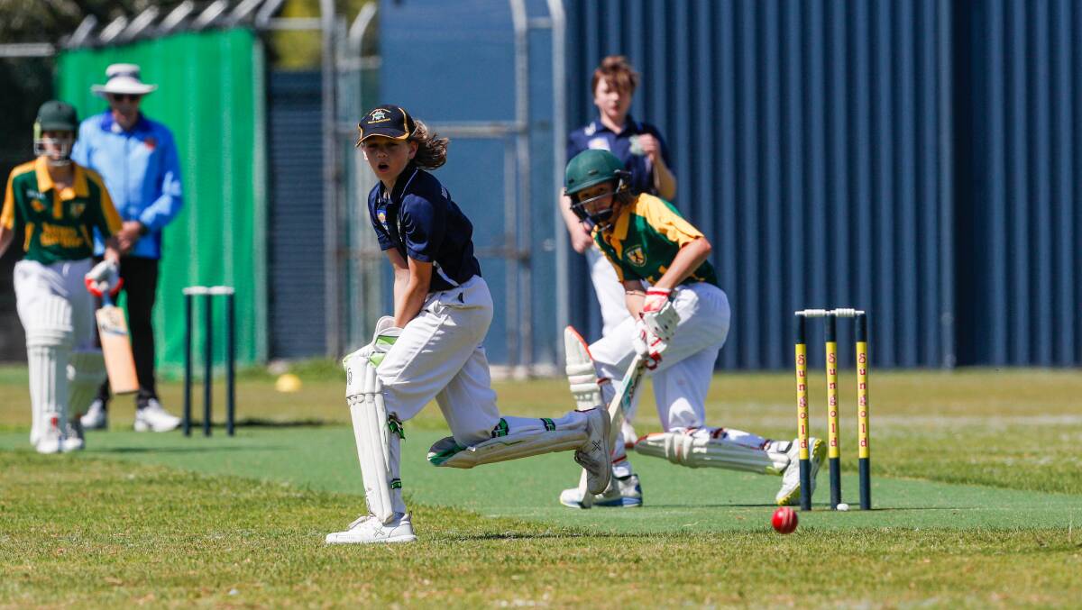 WATCH IT: WDCA wicketkeeper Flynn Gleeson and Mount Gambier's Jai Dellow have  eyes for the ball in the under 14 game. Picture: Michael Chambers