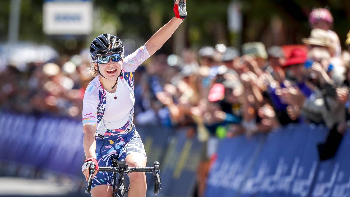Sarah GIGANTE celebrates a win as she crosses the finish line during the U23 and Elite Women's Road Race. Picture: Dylan Burns