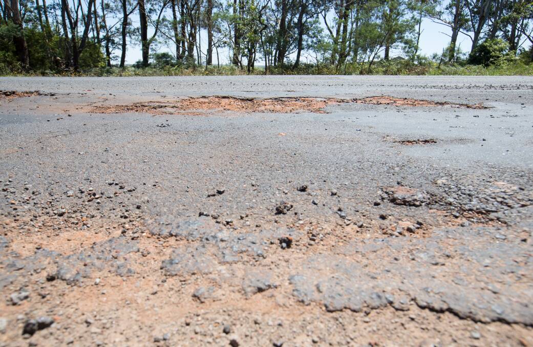 Sign of the times: Potholes are opening up across the district. Picture: Christine Ansorge