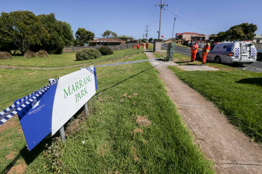 CRIME SCENE: SES help police to extract evidence from adjacent parkland after a man was shot in Merrivale in the early hours of Sunday morning. Picture: Michael Chambers 