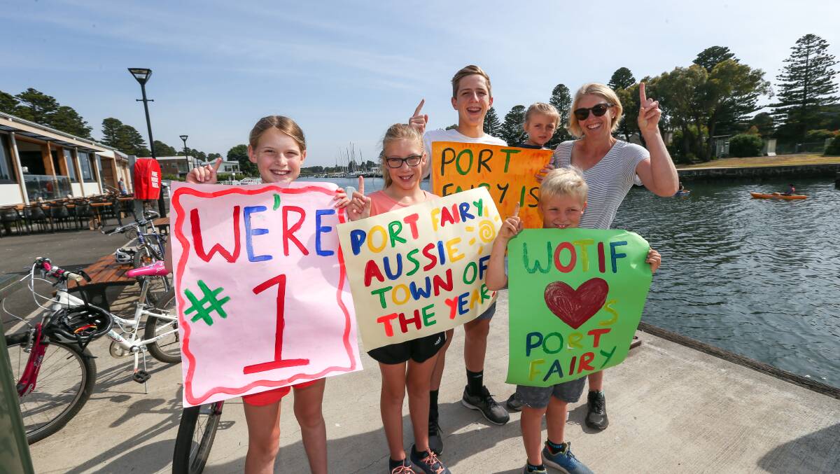 A happy day: Proud residents Olivia Rees 11, Phoebe Stuart 8, Lachie Rees 13, Lottie 4, Jett 8 and Mum Helen Stuart celebrate the day Port Fairy was named Wotif Aussie Town of the Year. Picture: Michael Chambers. 