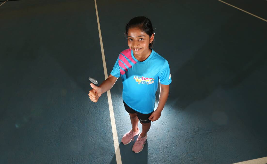 Hot Shot: Rhea Sony, 9, is off to the Australian Open to toss a coin at the start of a match on Friday. Picture: Michael Chambers