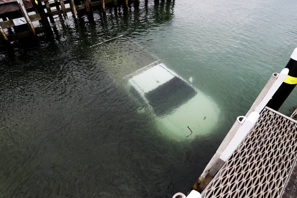 Under water:  A car towing a boat has ended up in the water at Warrnambool's boat ramp. Picture: Morgan Hancock