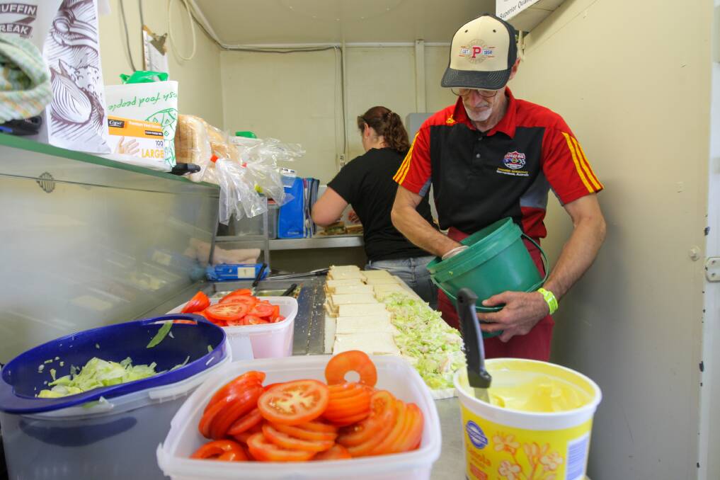 Canteen volunteer Mark Healey works on the sandwich production line. Picture: Rob Gunstone