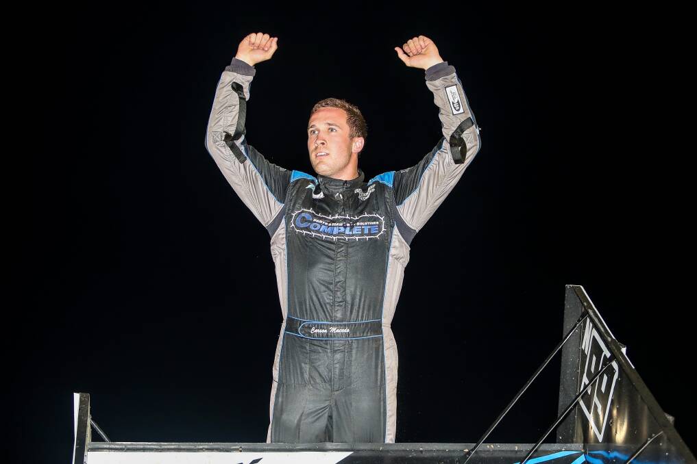 HOW'S THAT: American driver Carson Macedo celebrates winning the A-Main on night two of the Classic. Picture: Morgan Hancock .