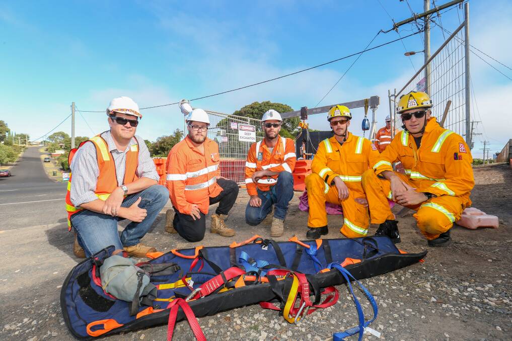 PREPARED: Warrnambool City Council's Rhyce Milward, Rob Carr engineer Josh Sneath, Rob Carr supervisor Trev Cahir and CFA fire fighters Adam Murphy and Ben Tatti. Picture: Christine Ansorge