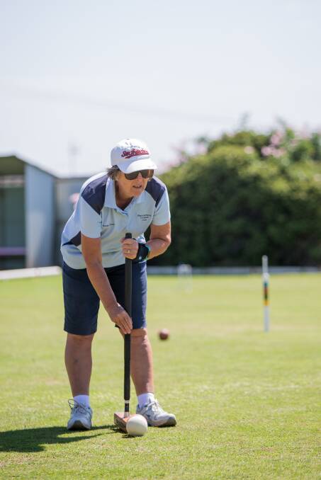 SPOT ON: Warrnambool City Croquet Club member Janelle Dunn in action during the tournament.  Picture: Christine Ansorge