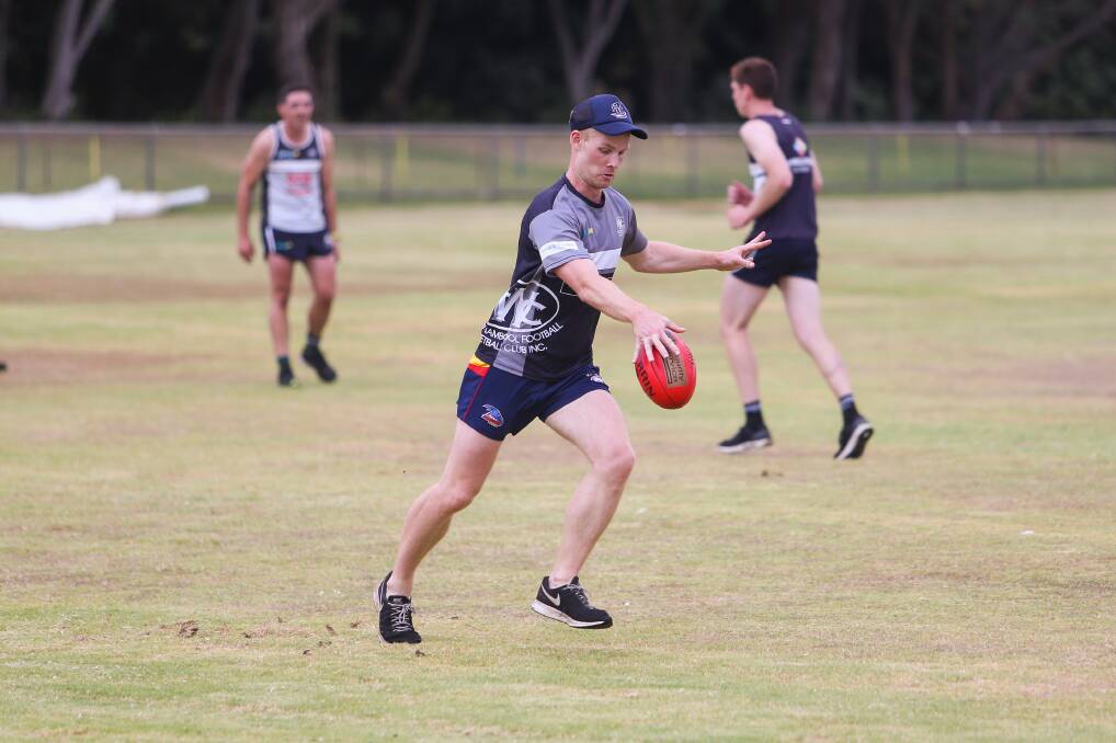 TUNE UP: Warrnambool defender Matt Colbert tests out his kicking skills during a Blues' training session at Jetty Flat on Friday. Picture: Morgan Hancock