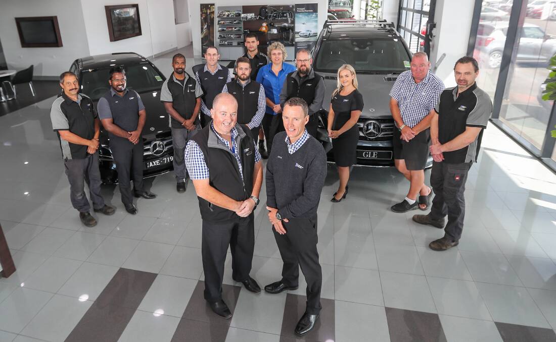 Winners: Sales manager Ashley White and dealer principal Steve Callaghan and the Callaghan's Mercedes Benz team have collected the 2018 national regional dealership of the year award. Picture: Morgan Hancock