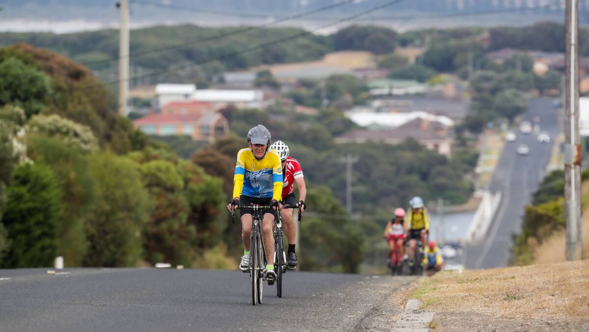 Wheel life: Cyclists complete the Hopkins Point Road hill. Picture: Morgan Hancock