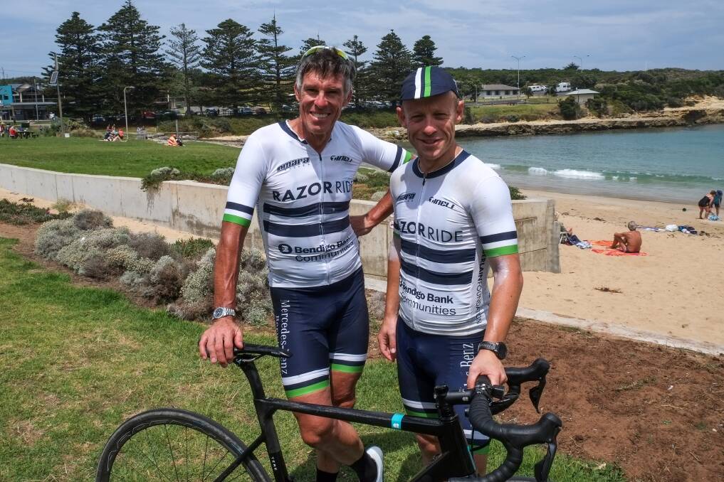 Riding for a cause: Australian cycling legend Phil Anderson and AFL umpire 'Razor' Ray Chamberlain in Port Campbell on the Chamberlain Foundation 'Razor Ride'. Picture: Rob Gunstone