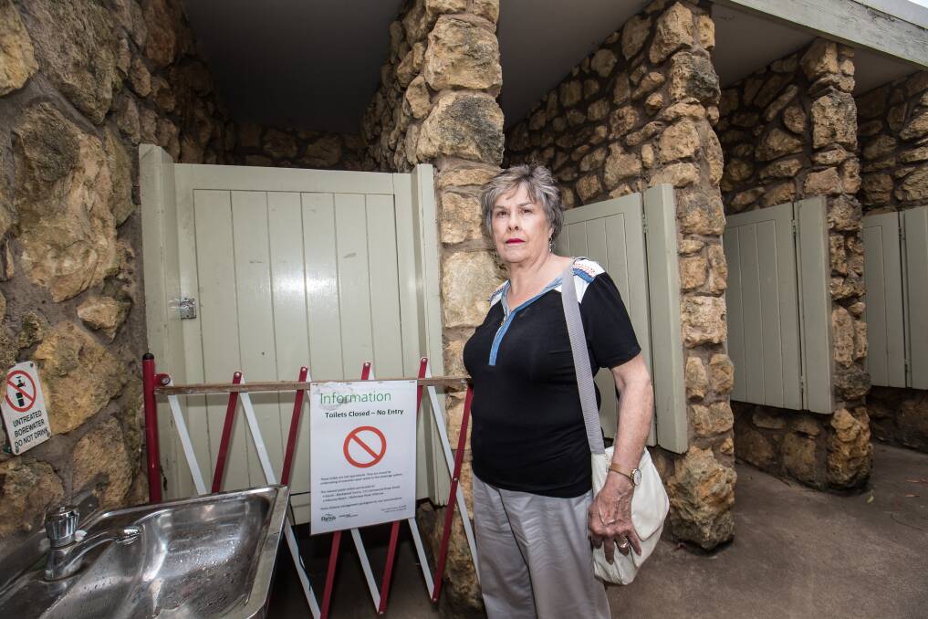 Out of order: Valerie Cameron was locked in this Tower Hill toilet cubicle for about 10 minutes on Thursday morning. Picture: Christine Ansorge