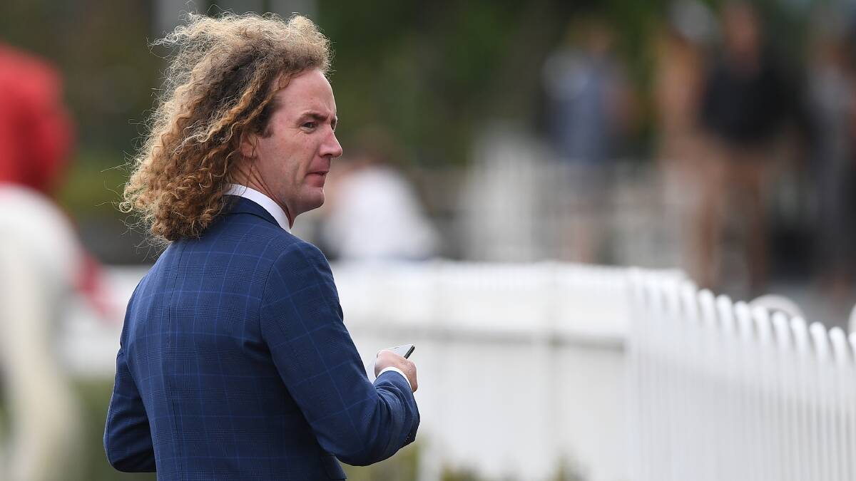 Trainer Ciaron Maher watches on at Caulfield Racecourse on Saturday. Picture: AAP Image/Julian Smith
