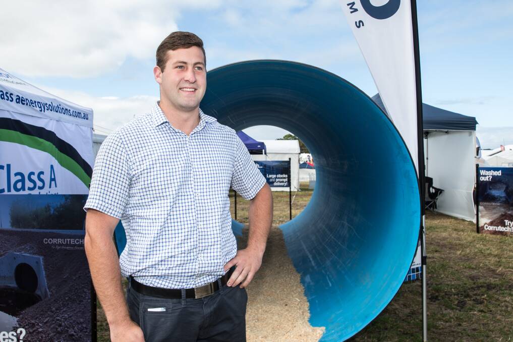 Sibling rivalry: Daniel Craig from Tefco Piping systems and his brother David Craig had their first exhibition in Warrnambool at this year's Field Days, with David winning the gate prize of a trip to New Zealand. Picture: Christine Ansorge