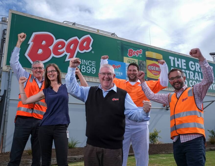 Celebration: Bega Koroit workers Mick Meade, Rhiannon Fischer, operations manager Chris Evans, Kevin Clifford and Brendan McKenzie are excited about the plans to expand the factory. Picture: Rob Gunstone
