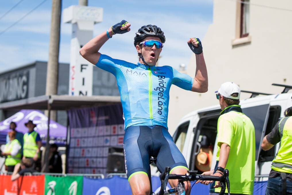 Cycling: Nicholas White celebrates as he crosses the finish line to win the 2019 Melbourne to Warrnambool Cycling Classic. Picture: Christine Ansorge