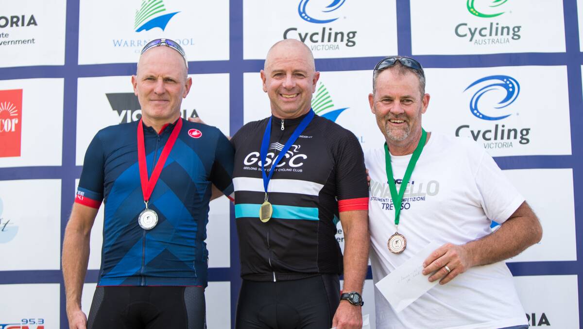 HAPPY DAY: Camperdown to Warrnambool Veterans placegetters Oliver King (second), David Spence (winner) and Gary Blick (third) celebrate together. Picture: Christine Ansorge