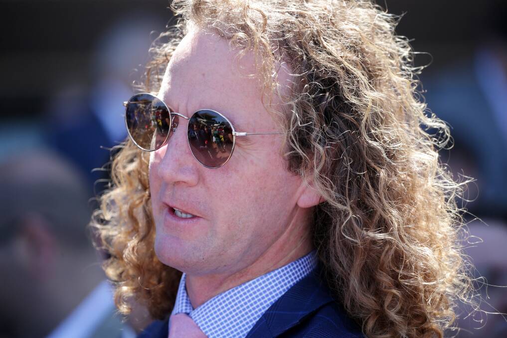 Trainer Ciaron Maher after jockey Ben Melham rode Global Exchange to victory on Saturday. Picture: AAP/George Salpigtidis.