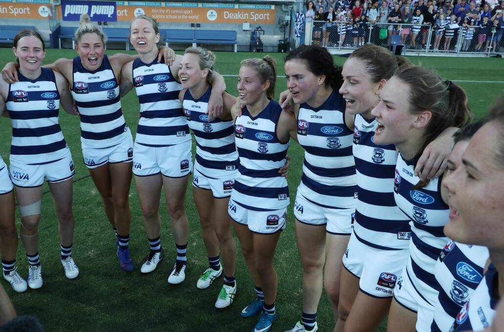 Winners are grinners: South-west export Georgia Clark busting out the Cats song with her teammates after Geelong's thrilling five-point win over Carlton on Saturday. Picture: AAP/David Crosling.