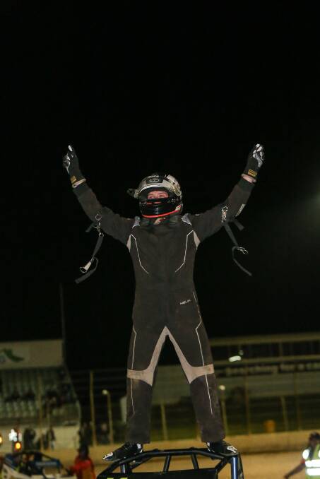 NUMBER ONE: Warrnambool's Alex Ross celebrates his victory on top of his car. Picture: Christine Ansorge