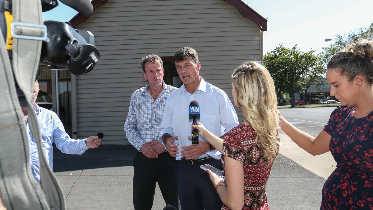 Federal Energy Minister Angus Taylor, flanked by Member for Wannon Dan Tehan, faces the media after talking with community members in Terang.  Picture: Christine Ansorge