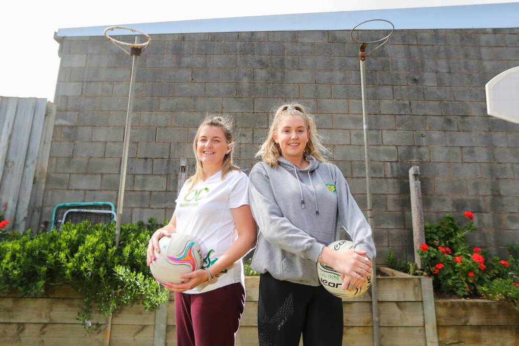Duo: Sara and Chelsea Quinn with the practice rings in their backyard. The mother-and-daughter combo will play at either end of the netball court for Old Collegians this season. Chelsea as goal shooter, Sara as goal keeper. Picture: Morgan Hancock