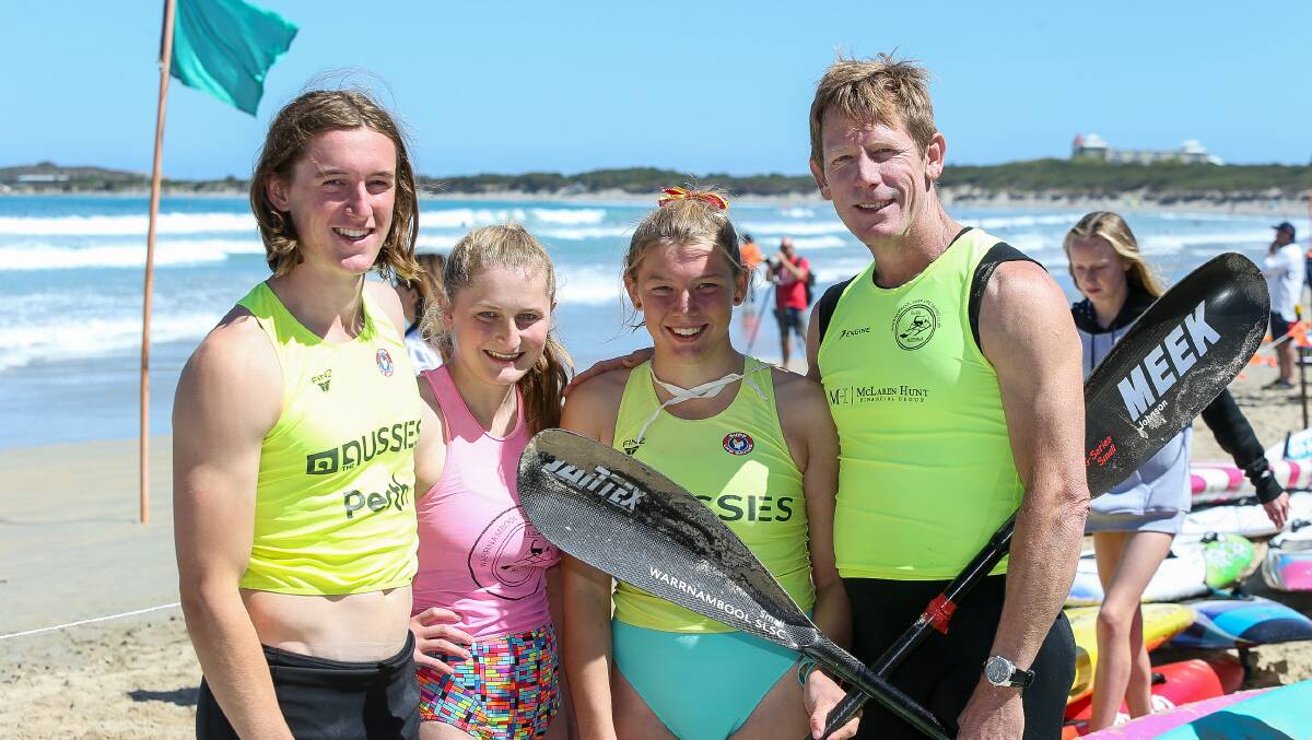 THE JOHNSONS: Isaac, 21, Alana, 19, Ellie, 16 and Ben, 47, at the Lifesaving Victoria State Championships on Saturday. Picture: Anthony Brady
