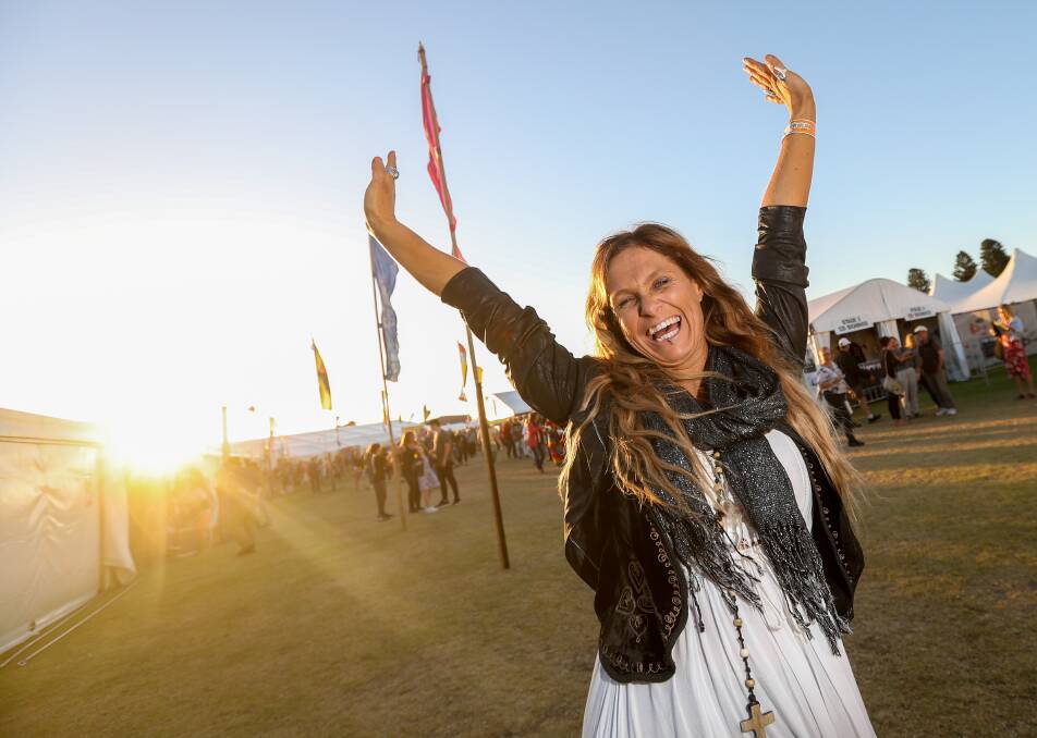 Soaking up the sun: Port Fairy Folk Festival Artist of the Year Kasey Chambers stretches out before her Saturday night performance.