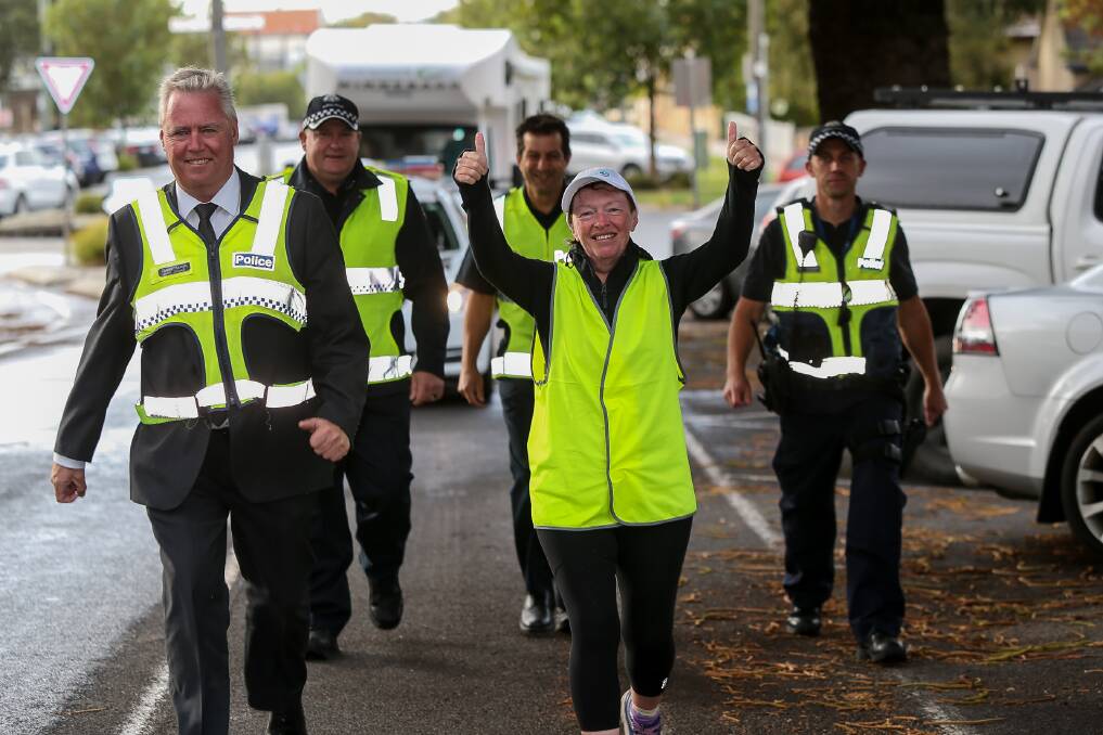Thumbs up: Donna Bowman walking to raise $1 million for the police welfare. She was joined in Warrnambool on Monday by police officers Shane Keogh, Paul Marshall, Greg Kew and Tim Brosowsky. Picture: Anthony Brady