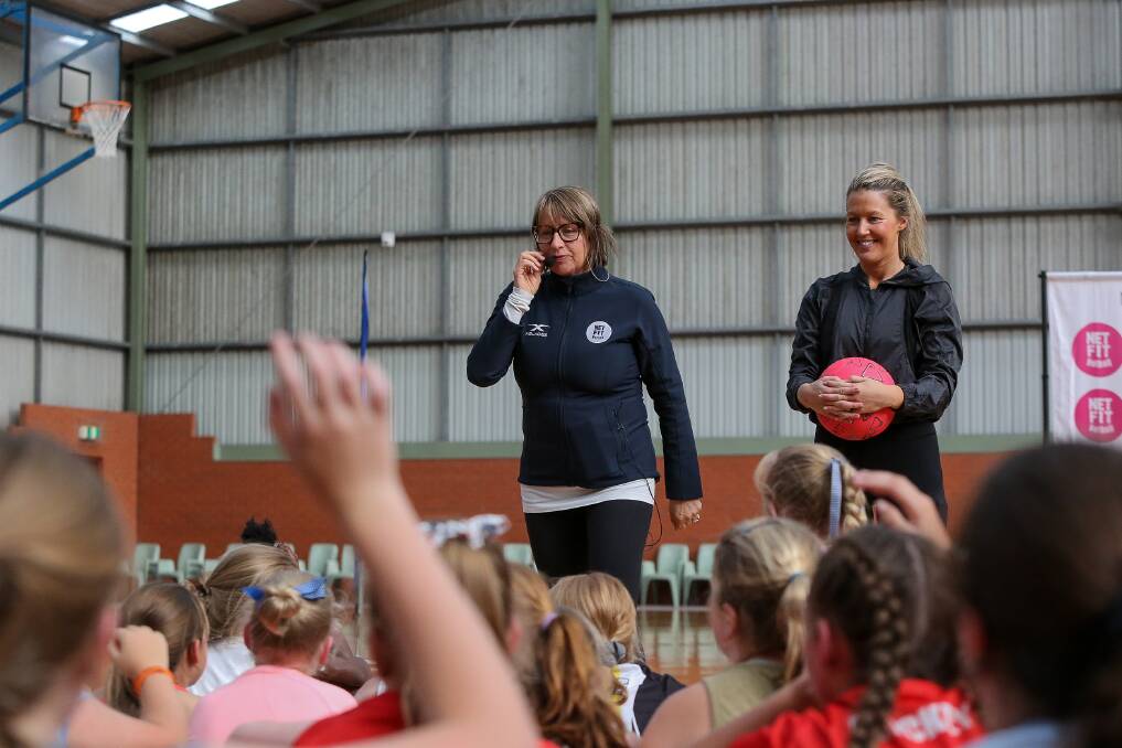 Footy dreams: Australian netball coach Lisa Alexander, here with Sarah Wall (right), said she wanted to become the first female coach of an AFL men's team. Pictures: Anthony Brady